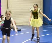 Kids skating in costumes at a previous Skate and Dance Night.