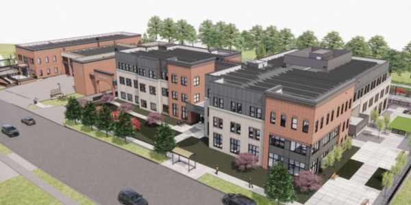 Architect’s rendering of a modern brick building complex with rooftop solar panels, trees, and surrounding streets.