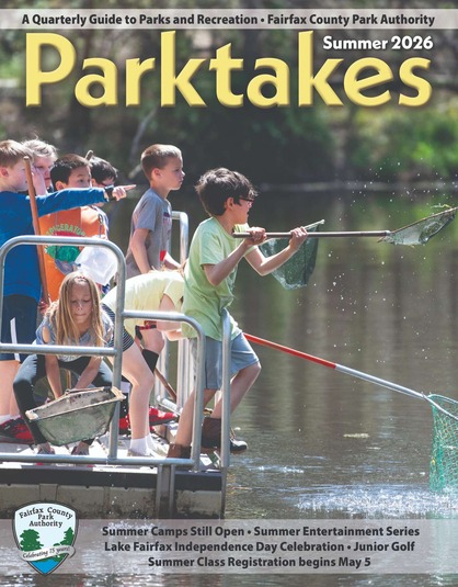 Children catch things in the lake on the cover of the latest Parktakes issue.