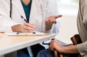 doctor with an intake form