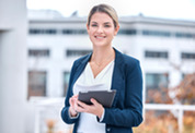 woman holding a notepad