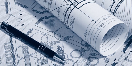 image of plans and a pen