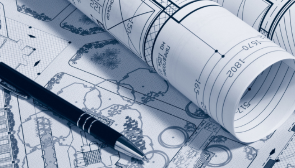 Zoning paperwork with a pen.