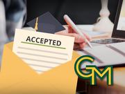Graphic of an envelope with an ‘ACCEPTED’ letter and graduation cap, over a student working at a laptop, with GMU logo.