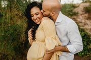 pregnant woman hugging man