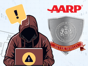 graphic of hacker sitting at a computer and the Silver Shield logo 