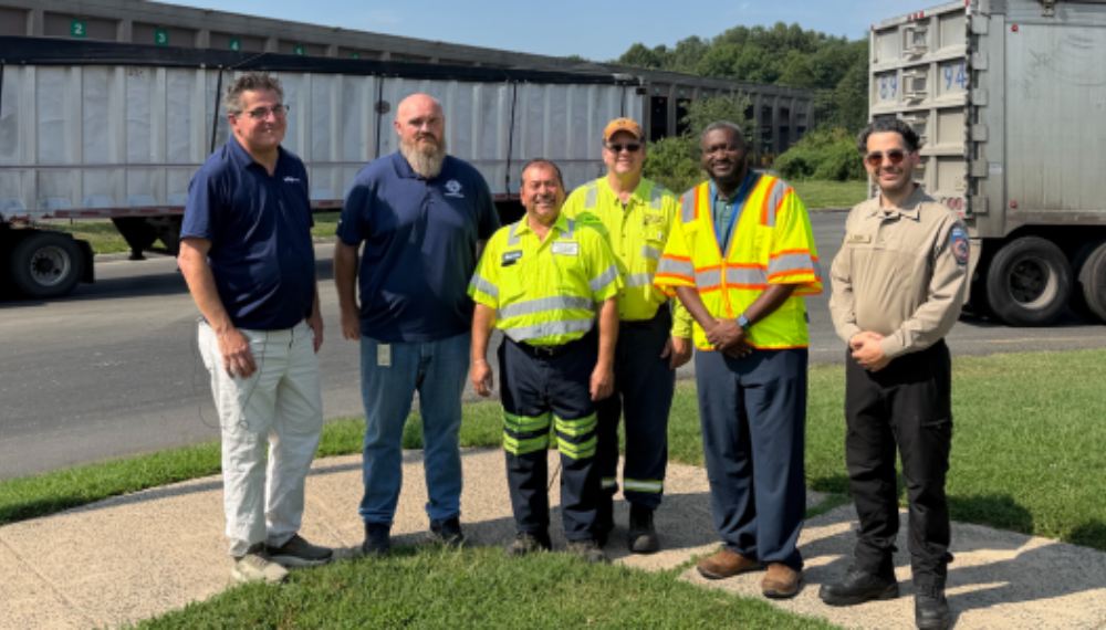 WTOP reporter Neil Augenstein, with staff from the Department of Public Works and Department of Animal Services.