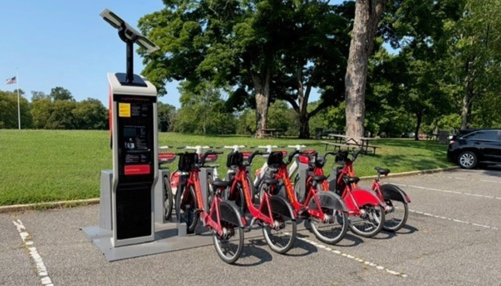 Bikeshare bikes parked at a station.