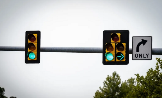 Green traffic lights with a green right turn arrow. 