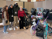 group of people with donations