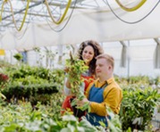 woman and young man in a nursery