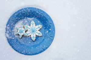 snowflake cookies in snow