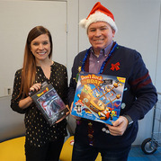 two people holding gifts