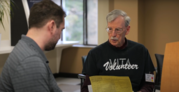 two men talking
