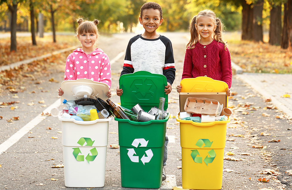 Kids with recycle bins