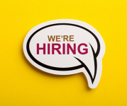 A speech bubble that says 'we're hiring' on a yellow background