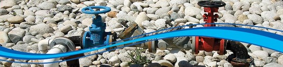 VAAWWA Backflow device image with AWWA splash across it