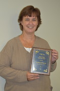 Donna Kinville with award