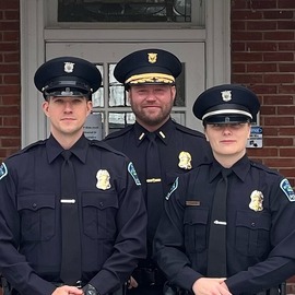 Police Academy graduation - Officer Justin Maki, Lt. Chris Bataille, and Officer Lucy Creedon