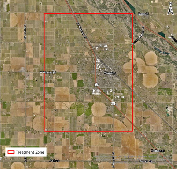 Japanese beetle planned treatment area map around Wapato. A red outline shows the treatment boundaries over aerial imagery. 