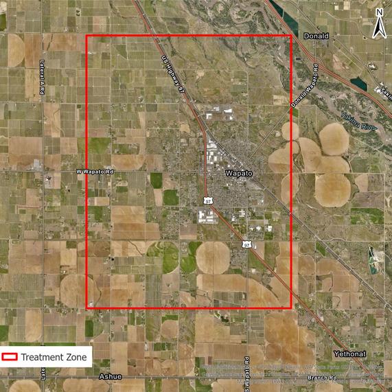 Japanese beetle planned treatment area map around Wapato. A red outline shows the treatment boundaries over aerial imagery. 