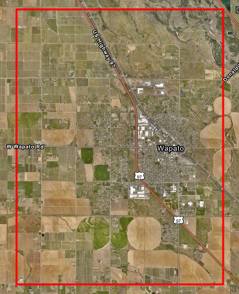 Japanese beetle planned treatment area map around Wapato. A red outline shows the treatment boundaries over aerial imagery. 