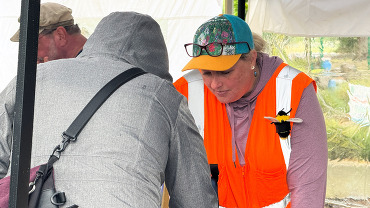 Erin Dunbar shares her love of native bees with visitors of the WaBA table at the Vancouver Pollinator Festival.