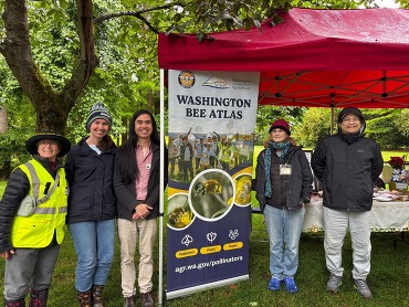 Groups photo of WaBA volunteers at the Ballard Locks outreach event. 