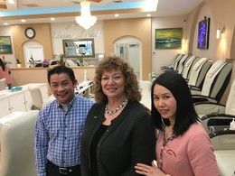 Universal Nails owners with mayor