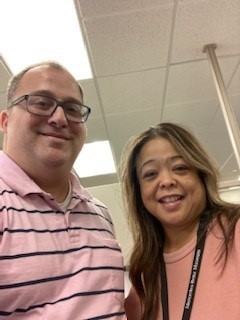 HR Analysts and Wellness Committee members Joe Nienalt and Terry Mendoza rockin’ the pink!