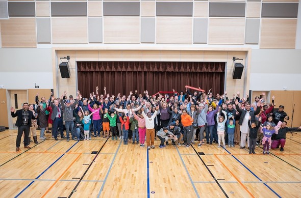 A large group photo at a ribbon cutting ceremony at Lea Hill Elementary School