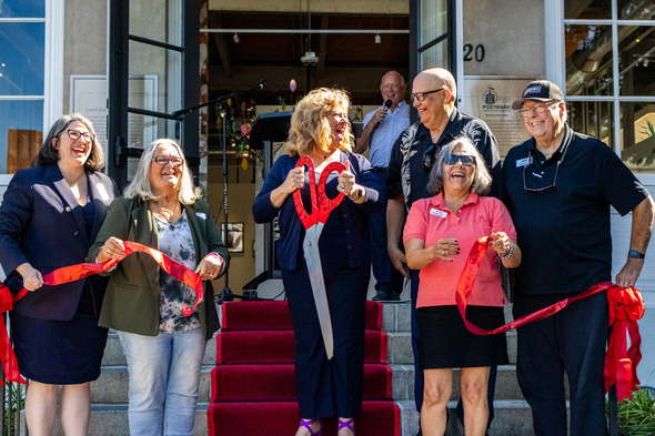 The Auburn City Council and Mayor Nancy Backus at a ribbon cutting for Postmark Saturday