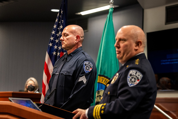 Sergeant Schultz standing near Chief Mark Callier