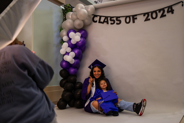 A West Auburn Senior High School student and her daughter getting a senior photo