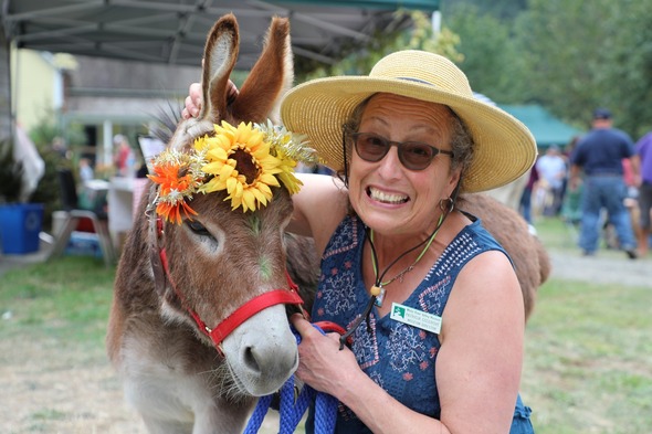 A woman and her donkey at the Mary Olson Farm