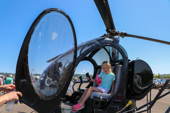 A little girl in a helicopter at Auburn Airport Day