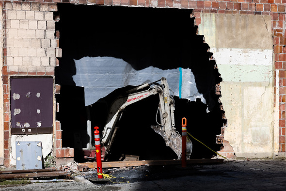 A large hole in the side of the Auburn Avenue Theater