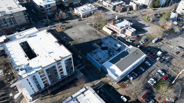 Aerial view of downtown Auburn showing vacant lots, surrounding buildings, and nearby streets.