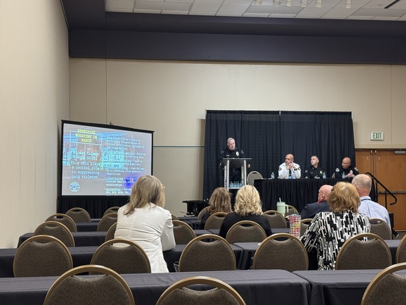 Police panel presents on proactive policing in Pasco with a presentation slide in view.
