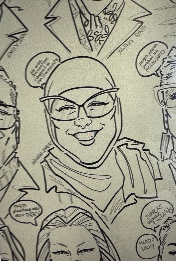 A caricature drawing of a city councilwoman smiling 