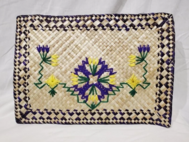 An embroidered mat 