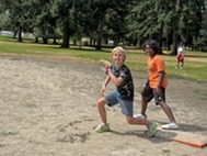 2 boys playing baseball