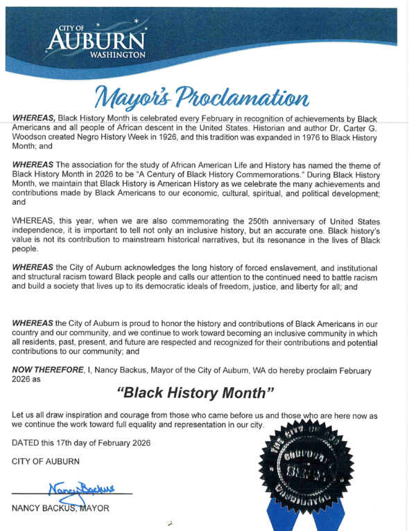 A scan of the Black History Month proclamation, with words included right above this photo. 