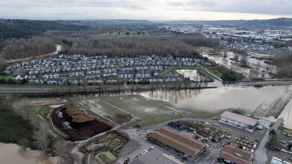 A neighborhood partially submerged in water 