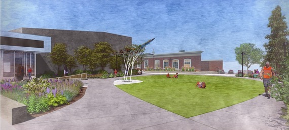 Rendering of a proposed downtown park with lawn, pathways, landscaping, public art and nearby buildings.