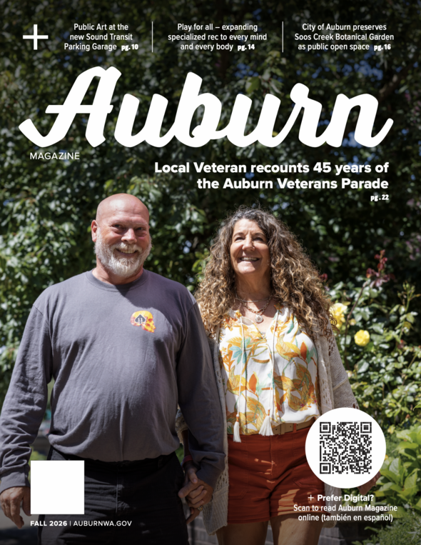 Fall 2026 Auburn Magazine cover featuring Jonathan and Angie Davenport standing together in a garden.