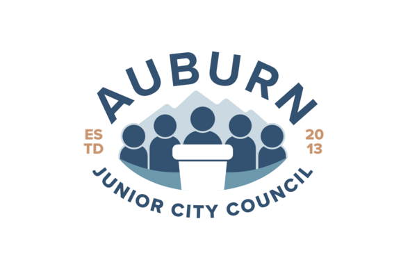 Auburn Junior City Council logo featuring five figures behind a podium with mountains in the background.