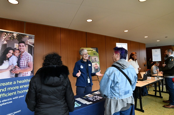 City staff talk with members of the community at the 2025 Residential Permitting Expo.