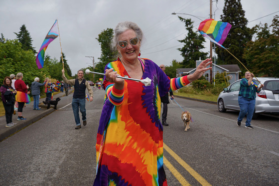 Commissioner Bacon twirling a baton in the Langley Pride Parade