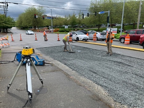 Crews are preparing the street for a concrete pad where buses will stop on 33rd Avenue West.